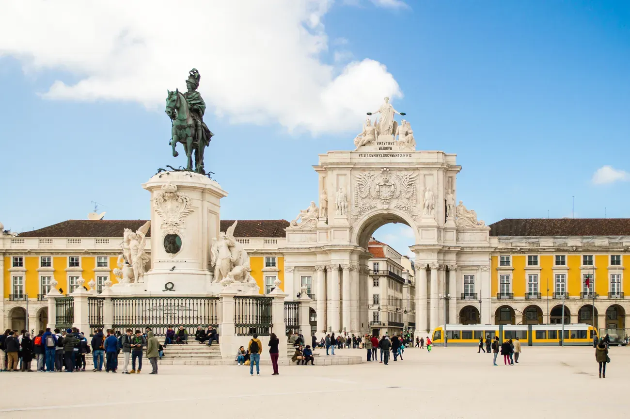 The statue of King Jose I and the triumphal arch on the Praca do Comercio in Lisbon