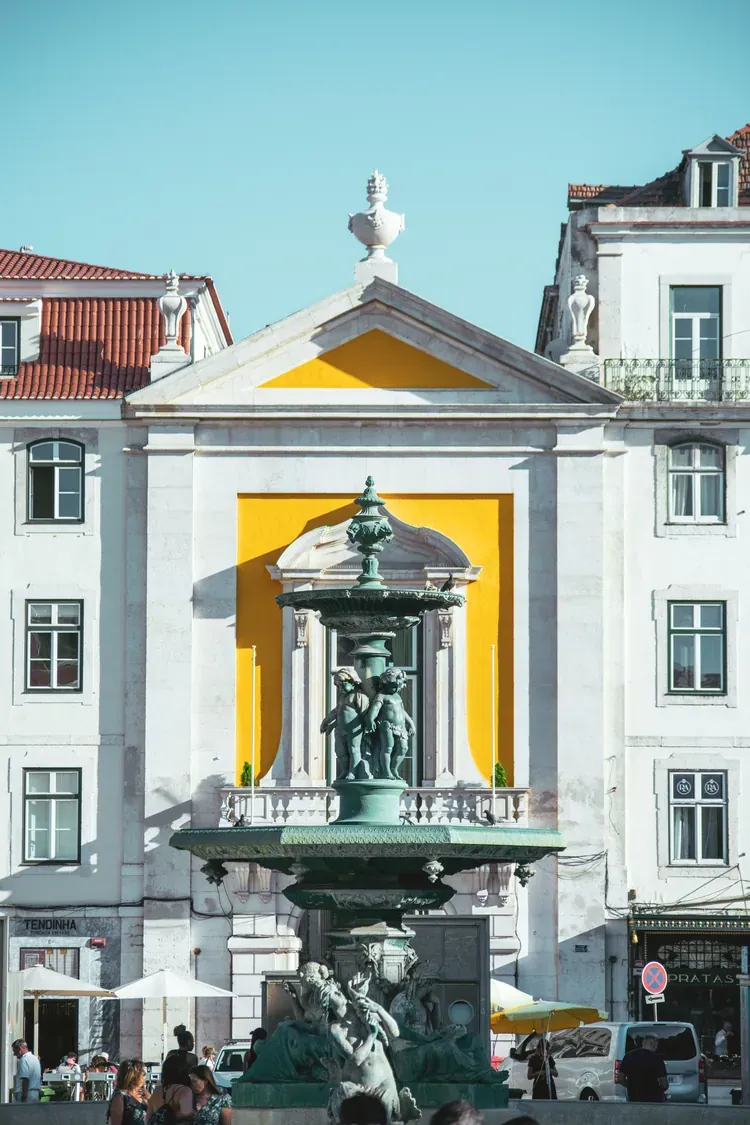 A baroque bronze fountain in Rossio Square in Lisbon