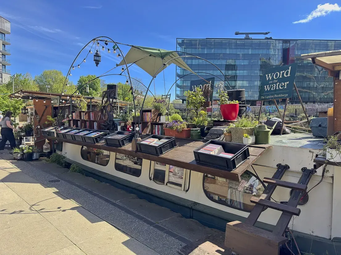 The Word on the Water book barge moored on the Regent's Canal towpath at King's Cross in London