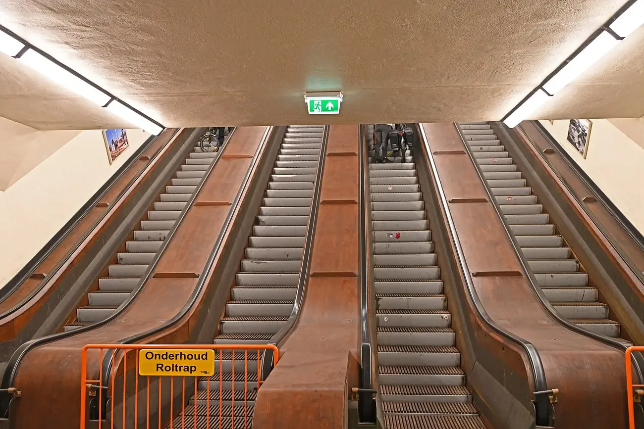The long wooden escalators leading down to the cycle tube of the Maastunnel in Rotterdam