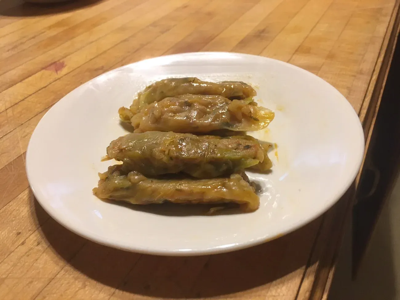 Mahshi, cabbage leaves rolled around a rice and herb filling