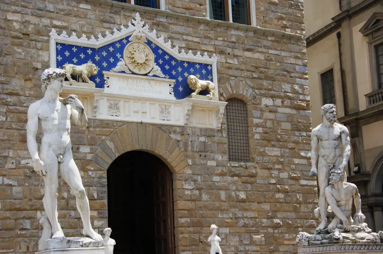 Main entrance of Palazzo Vecchio with the statues of David and Hercules and Cacus