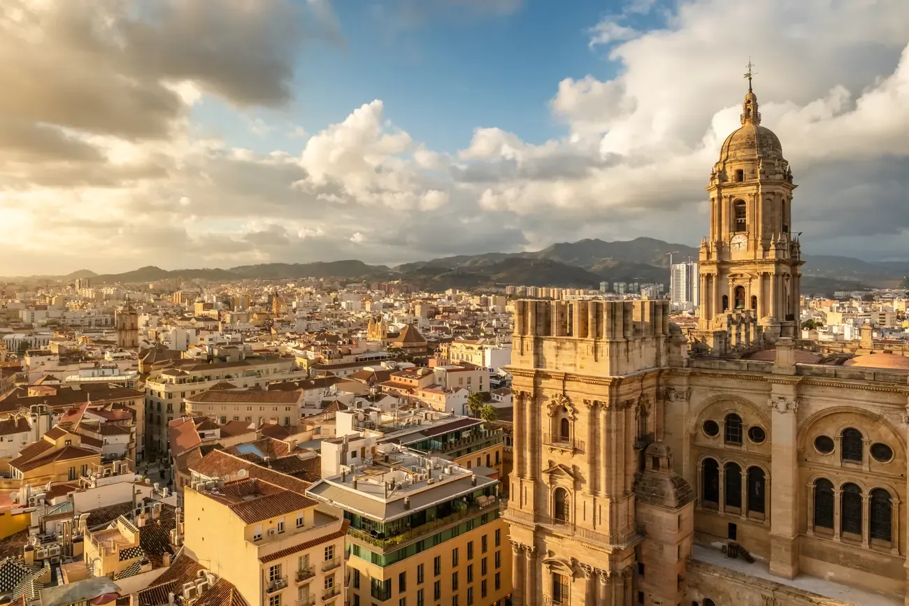 Malaga Cathedral above the old town at sunset