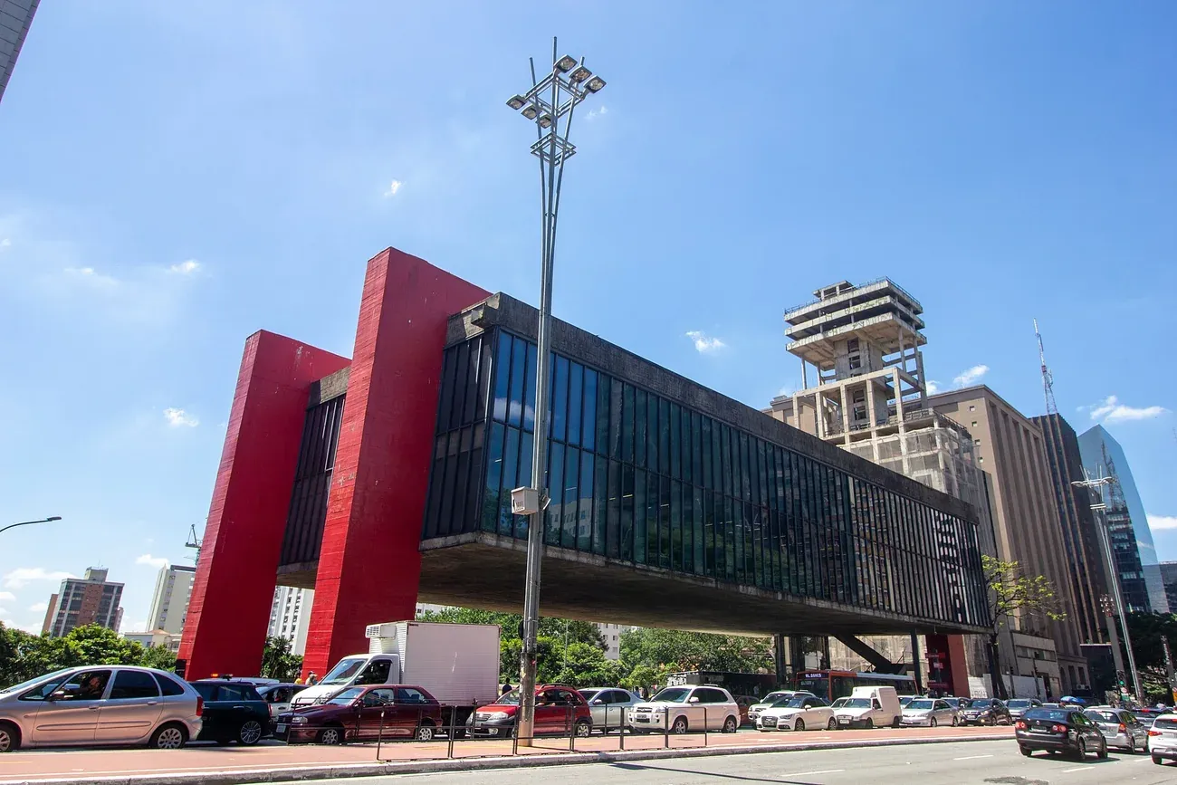 The red concrete frame of MASP holding its galleries above Avenida Paulista