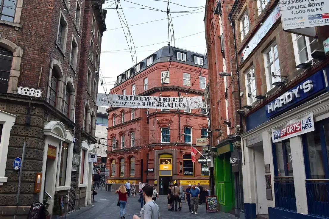 The narrow red brick lane of Mathew Street in the Cavern Quarter, Liverpool
