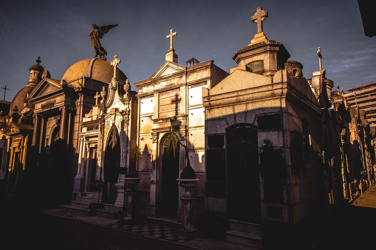 A lane of ornate mausoleums in La Recoleta Cemetery, Buenos Aires