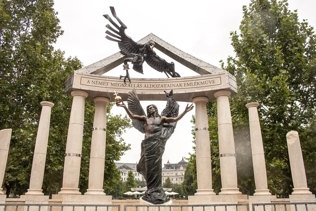 The colonnade with the eagle and the archangel Gabriel of the Memorial for Victims of the German Occupation on Szabadsag ter in Budapest