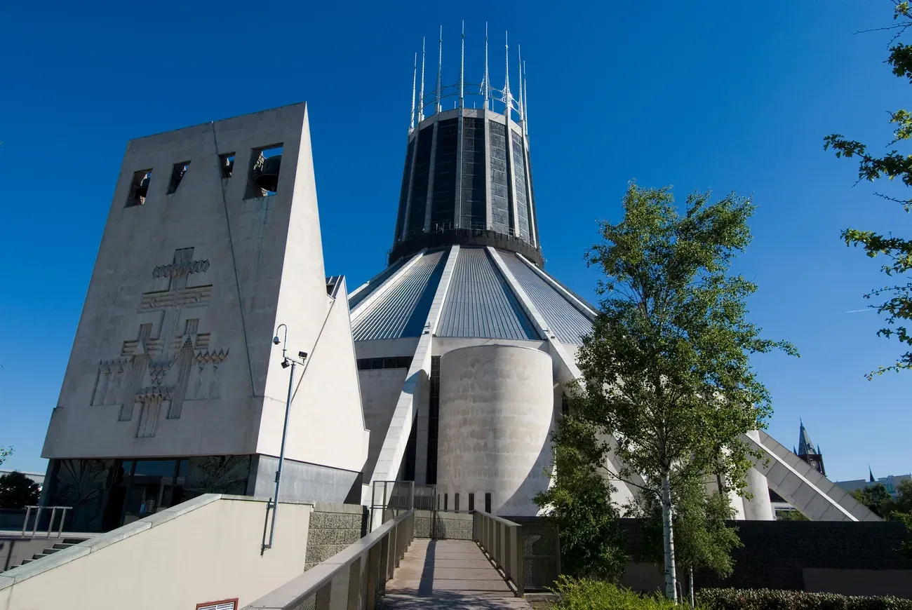 The concrete bell tower and conical lantern of Liverpool Metropolitan Cathedral on a clear day