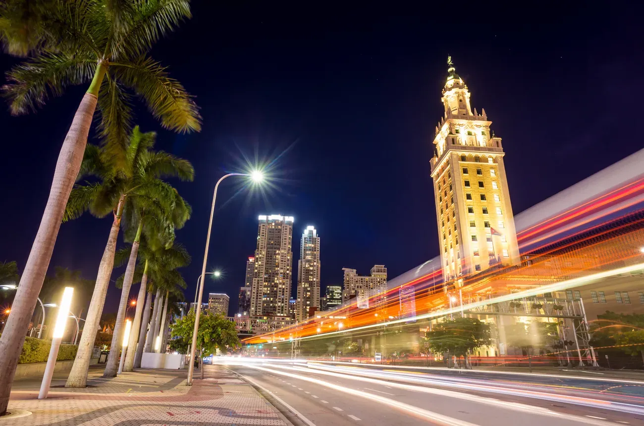 The illuminated Freedom Tower at twilight in Miami