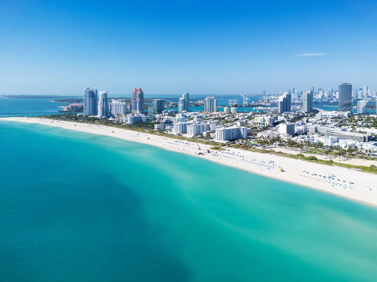 An aerial view of the South Beach coastline and Miami Beach skyline