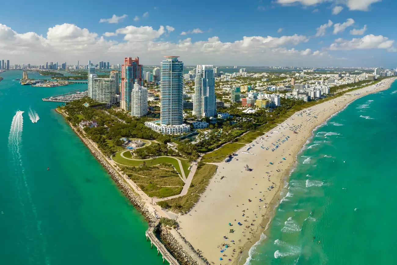 Sunbathers on the sand at South Beach in Miami Beach