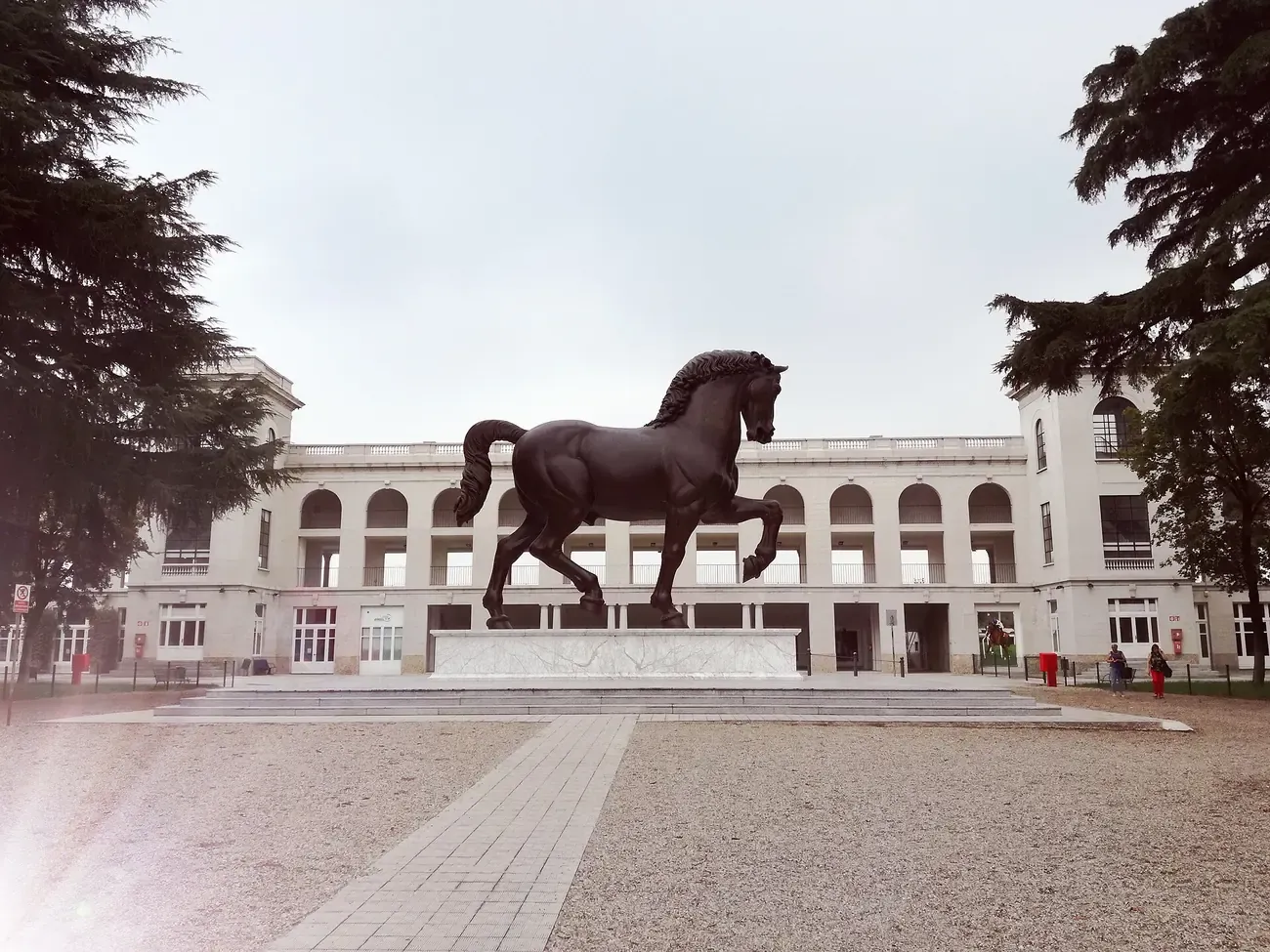 Leonardo's Horse, the bronze statue by Nina Akamu, standing on its plinth in front of the San Siro Hippodrome in Milan