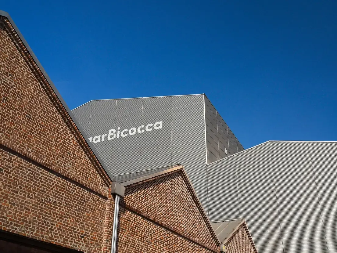 Brick and metal-clad exterior of the Pirelli HangarBicocca former industrial hangar in Milan