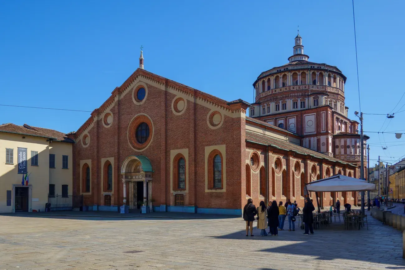 The brick facade and Renaissance tribune of Santa Maria delle Grazie in Milan, home of the Last Supper