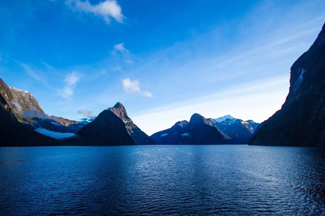 The steep walls of Milford Sound seen from a cruise boat on the fiord