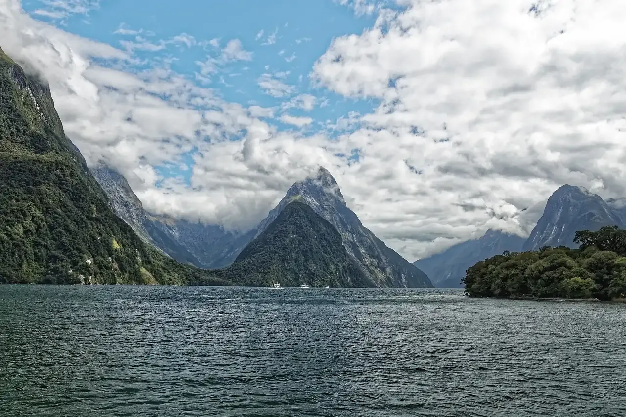 Mitre Peak rising above the dark water of Milford Sound in Fiordland