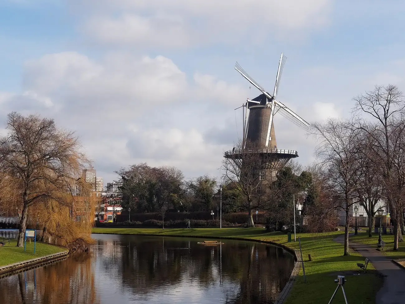 The brick tower mill Molen De Valk beside the water on the Lammermarkt in Leiden