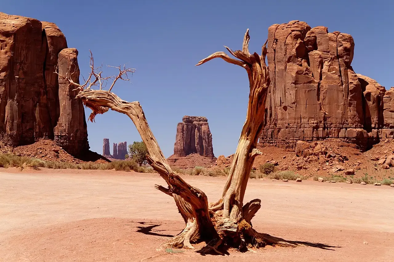 Sandstone buttes rising from the desert floor in Monument Valley on the Navajo Nation