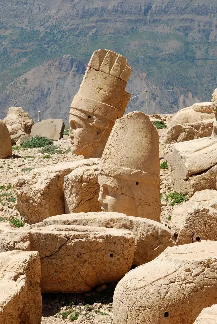 Toppled heads and seated torsos on a terrace of Mount Nemrut in Adiyaman province