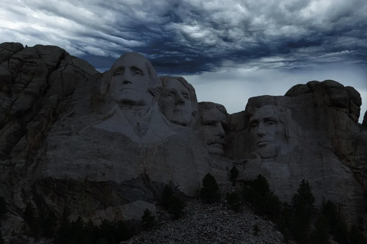 The Mount Rushmore carving under heavy cloud in South Dakota