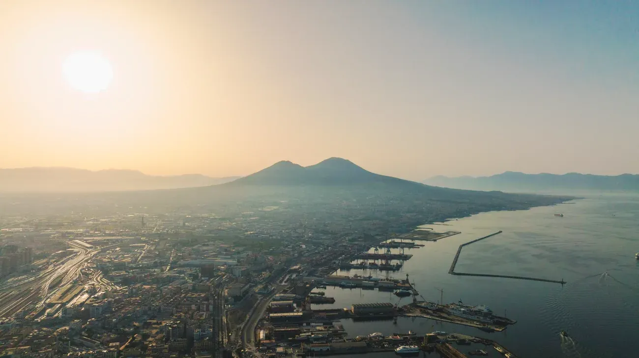 Aerial panoramic view of Mount Vesuvius and the Bay of Naples at sunrise
