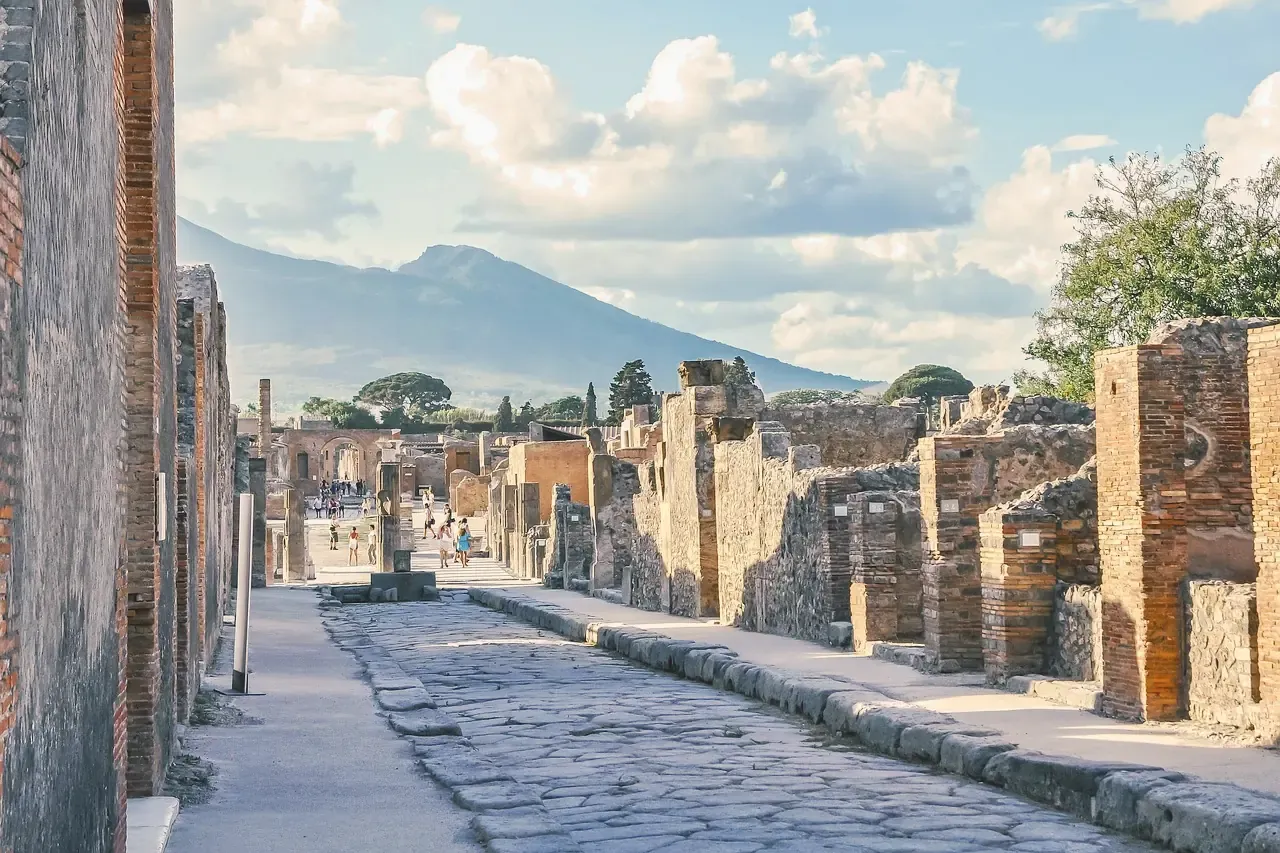 Mount Vesuvius framed between the ancient columns of Pompeii