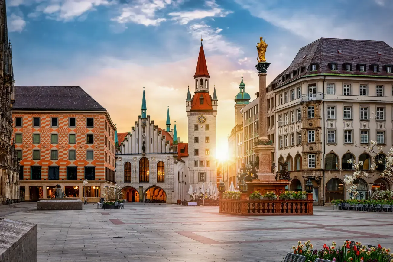 Munich's Marienplatz at sunset with the Altes Rathaus tower and Mariensaule