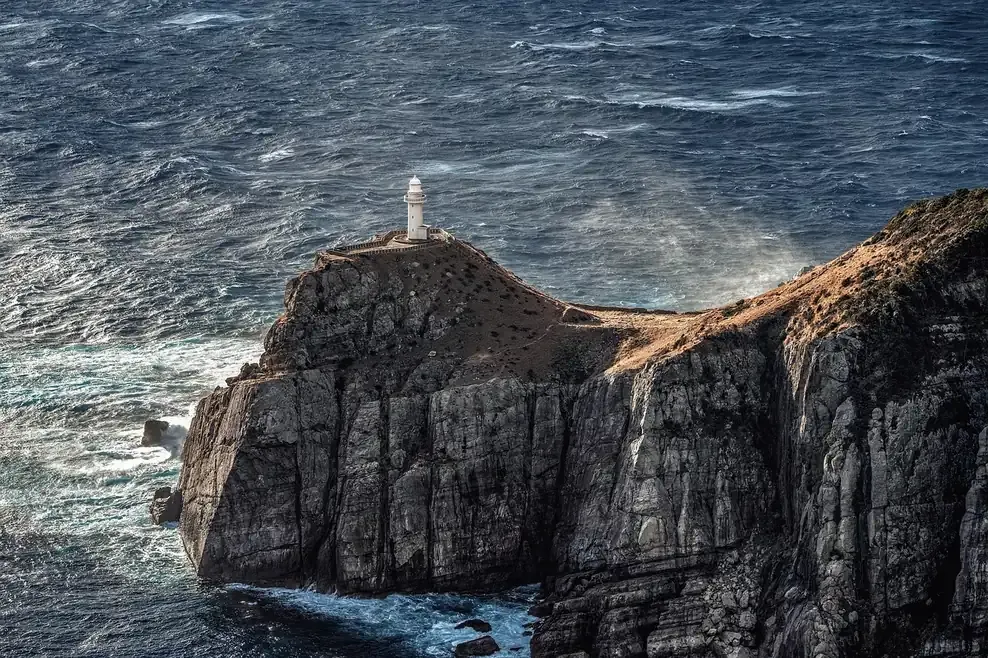 The Nazare headland and lighthouse above Praia do Norte