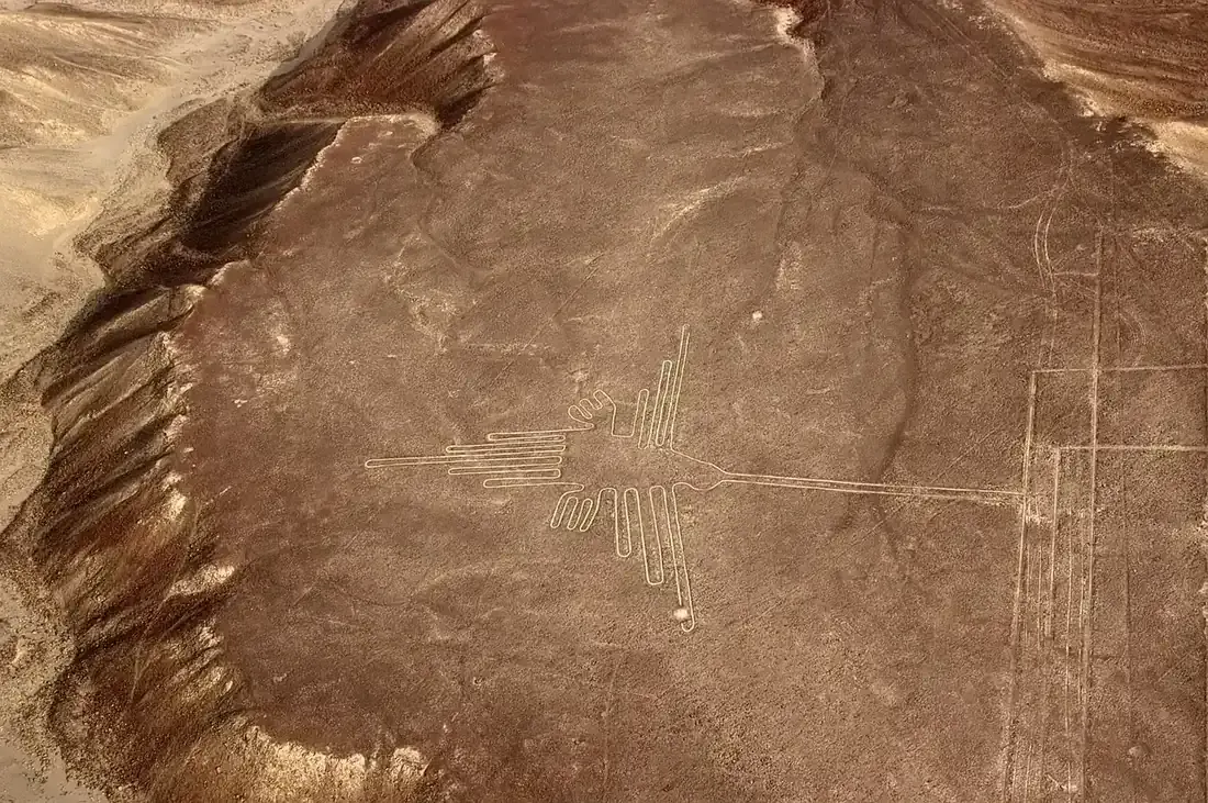 The hummingbird geoglyph of the Nazca Lines seen from the air, Peru