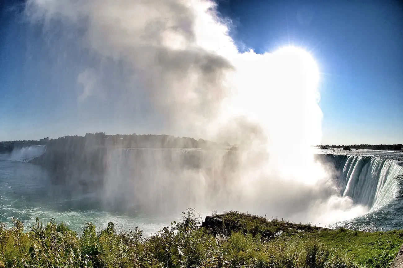 Niagara Falls with mist and sunlight over Horseshoe Falls