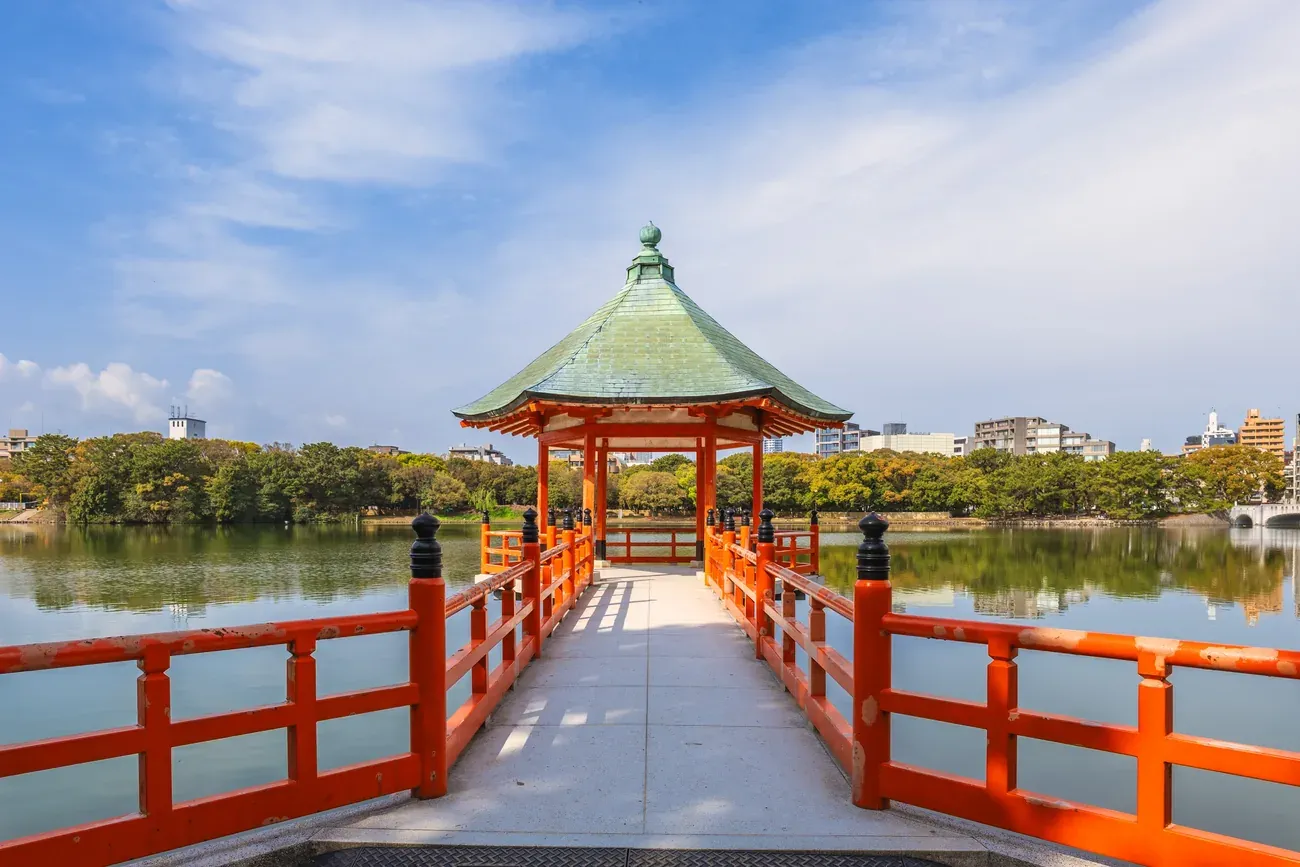 A pavilion and red bridge at Ohori Park, Fukuoka