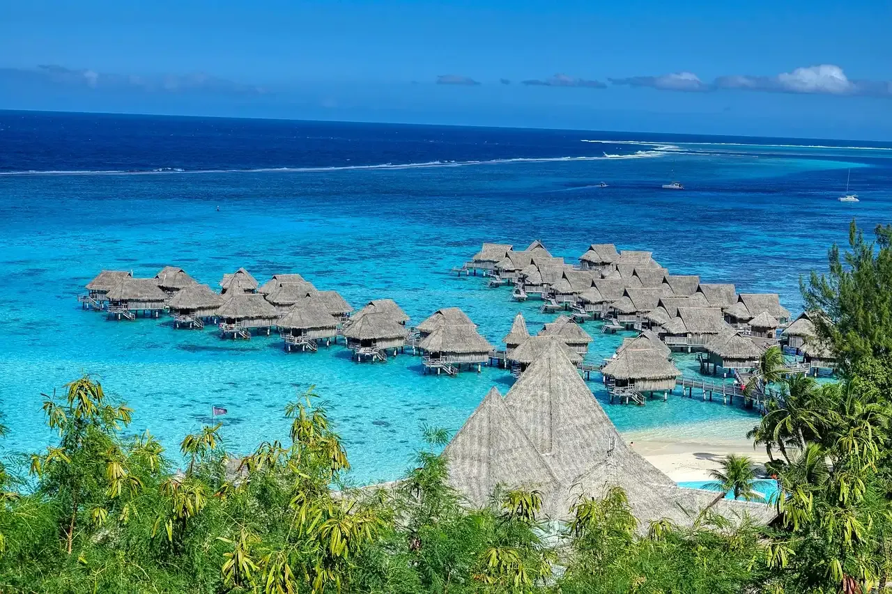 Overwater bungalows on the lagoon of Moorea seen from above