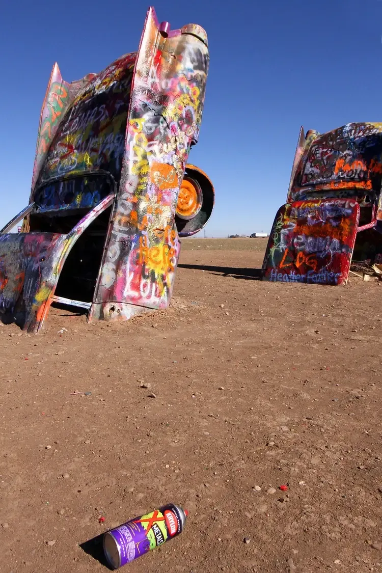Spray-painted cars buried nose down at Cadillac Ranch near Amarillo, Texas