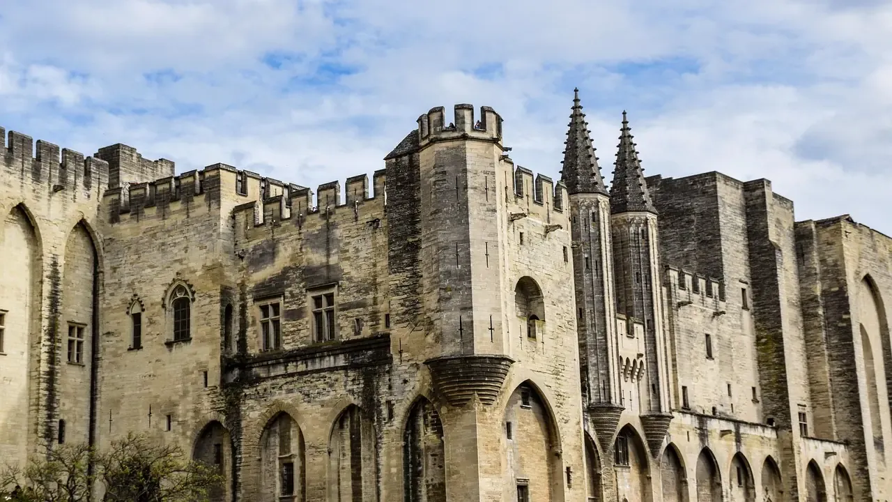 Towers and battlemented walls of the Palais des Papes in Avignon, France