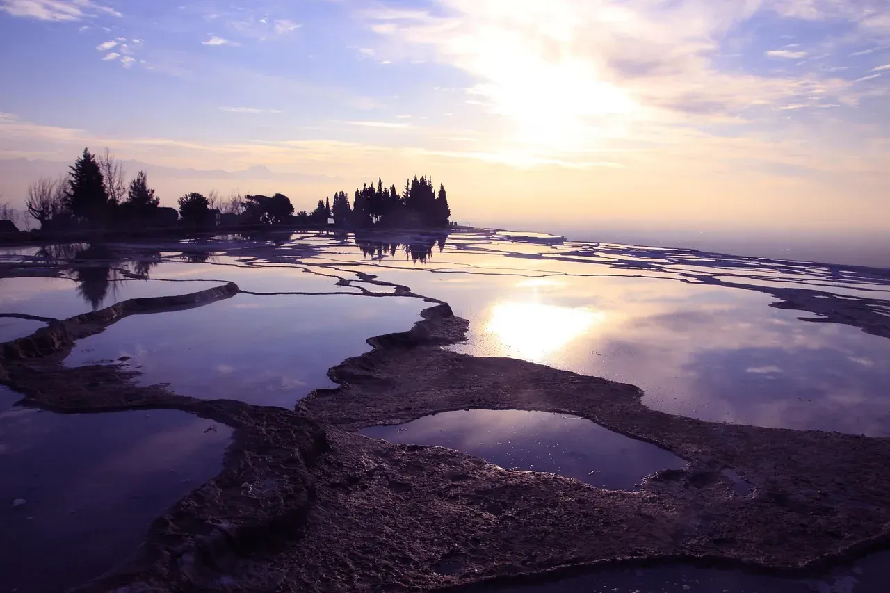 The Pamukkale terraces reflecting the sunset in Denizli province