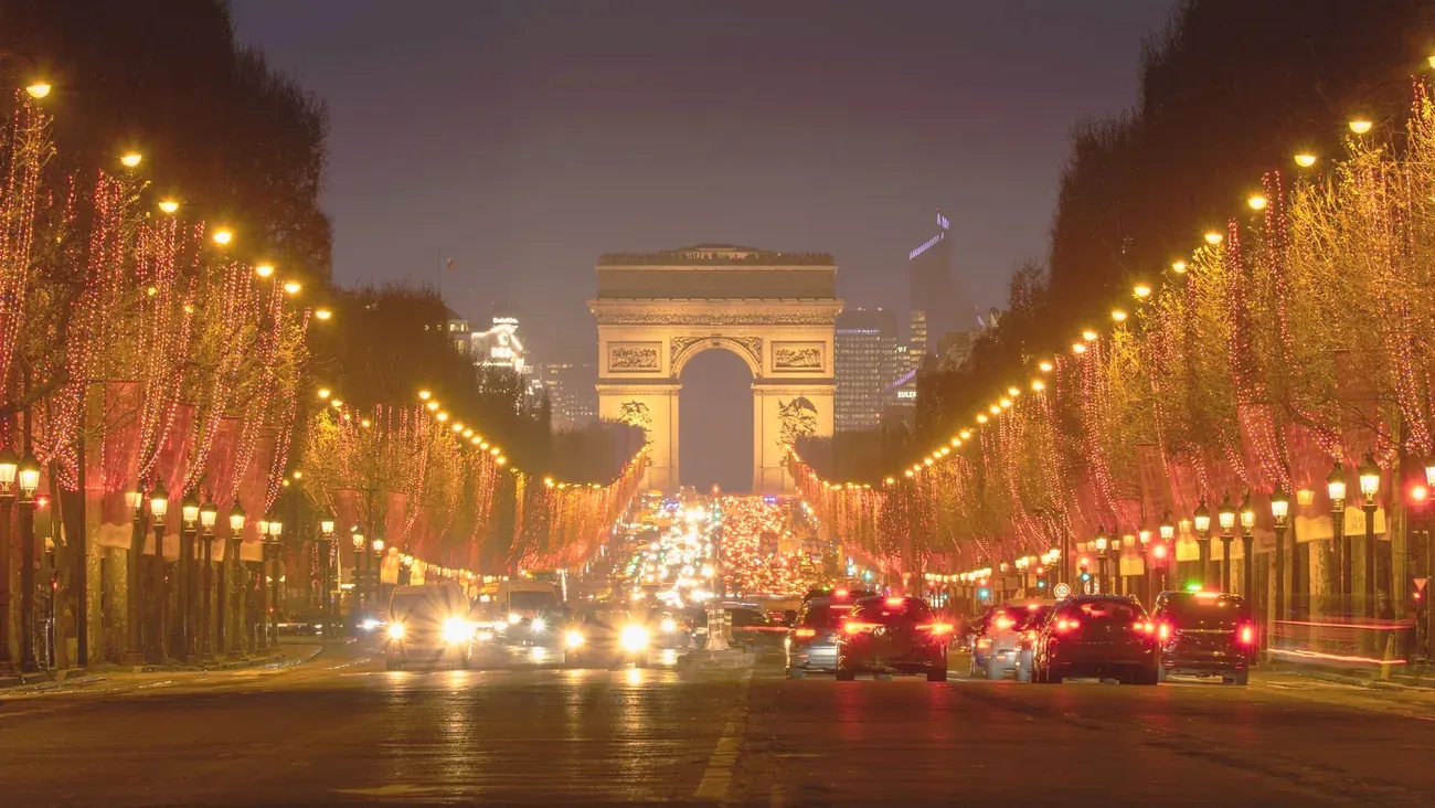 The Champs-Elysees lit with Christmas lights leading to the Arc de Triomphe, Paris