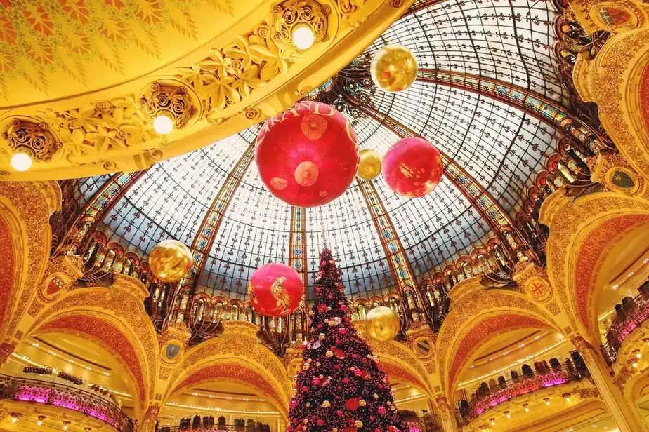 The Christmas tree and baubles under the glass dome of Galeries Lafayette in Paris