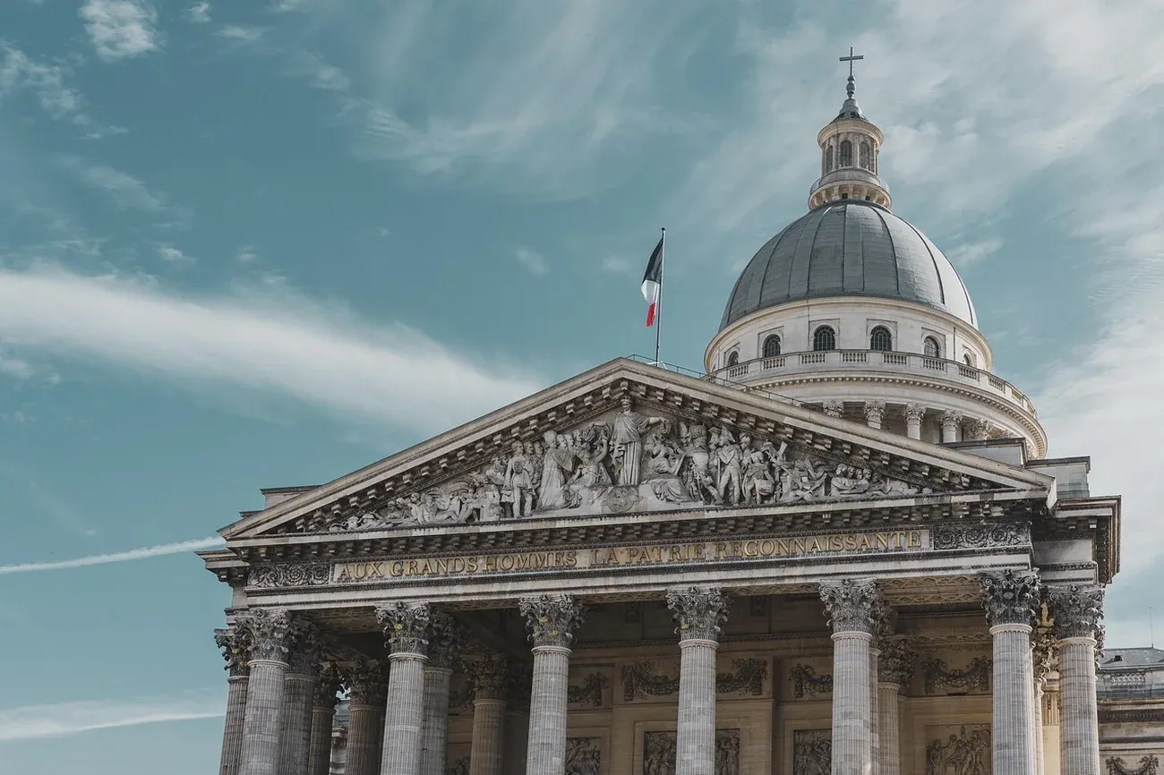 The pedimented facade and dome of the Pantheon in Paris