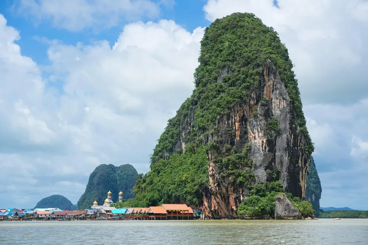 A floating fishing village below the cliffs of Phang Nga Bay