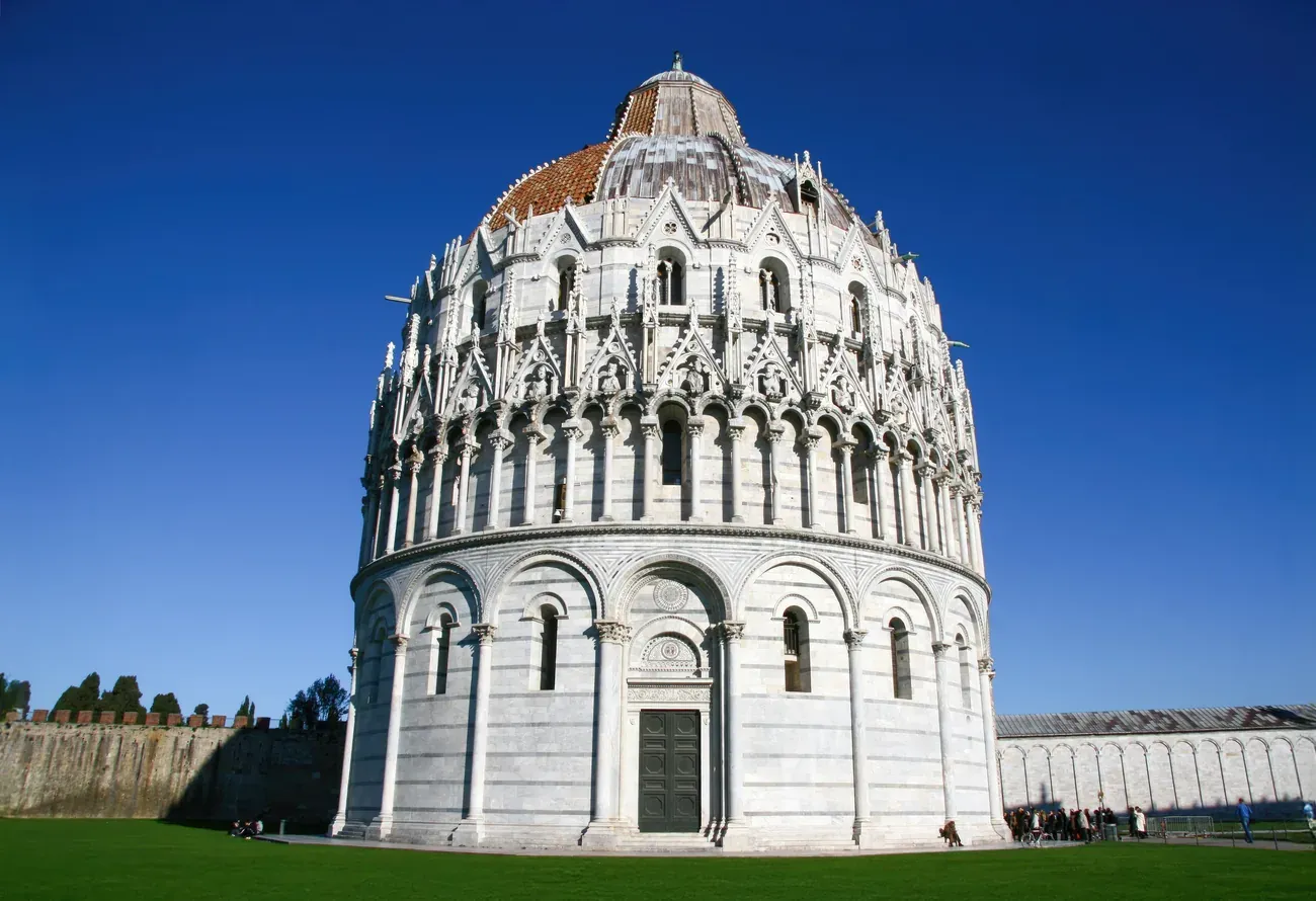 The Baptistery of Pisa in the Piazza dei Miracoli on a clear day