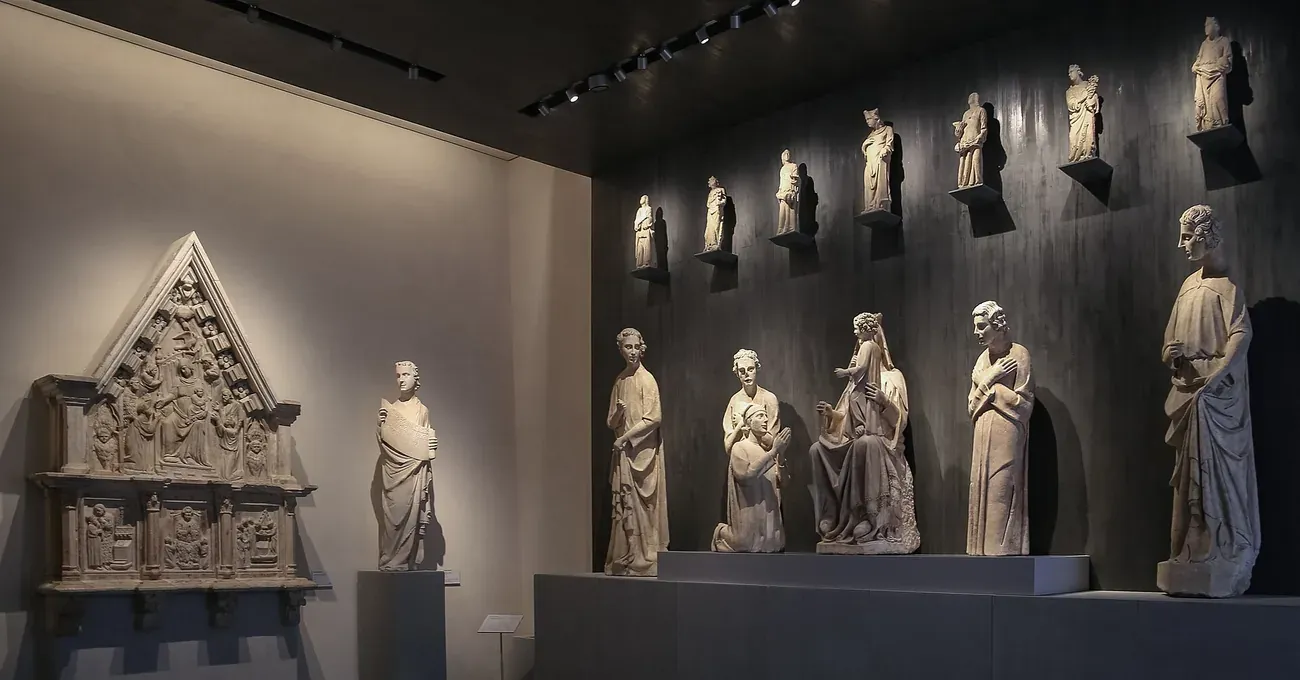 Medieval statues in a gallery of the Museo dell'Opera del Duomo in Pisa