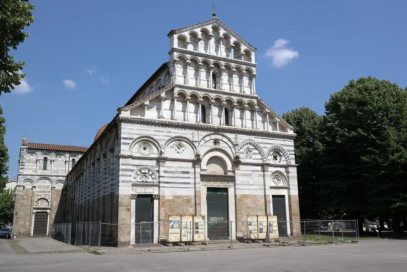 The striped marble Romanesque facade of San Paolo a Ripa d'Arno in Pisa