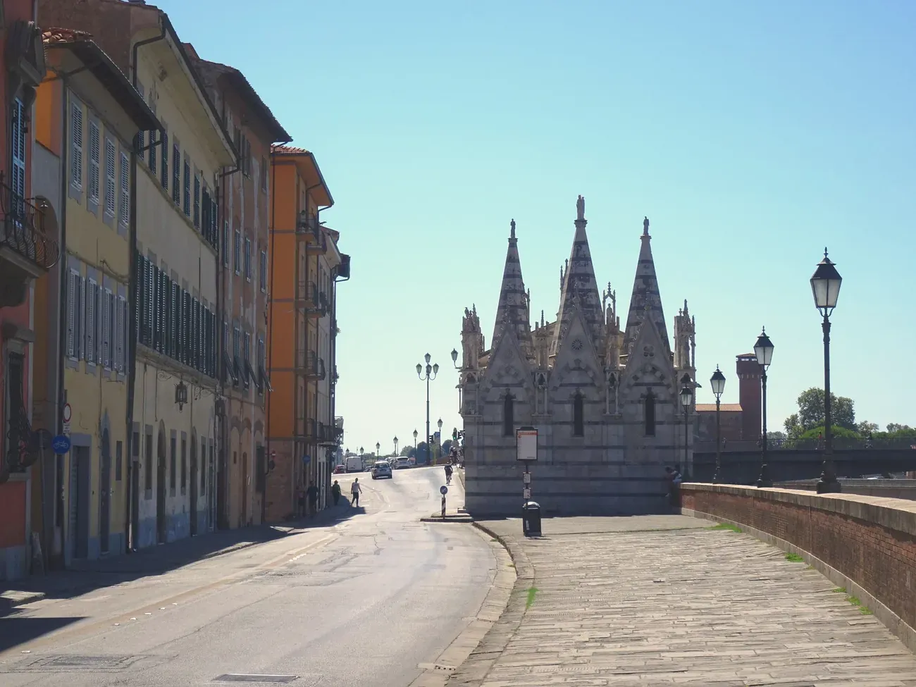 The Gothic spires of Santa Maria della Spina along the Lungarno in Pisa