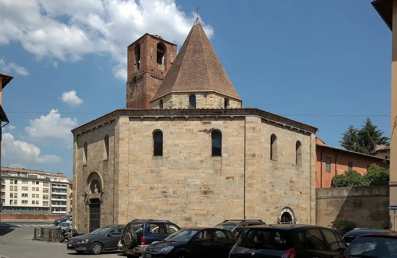 The octagonal church of Santo Sepolcro in Pisa with its pyramid roof and bell tower