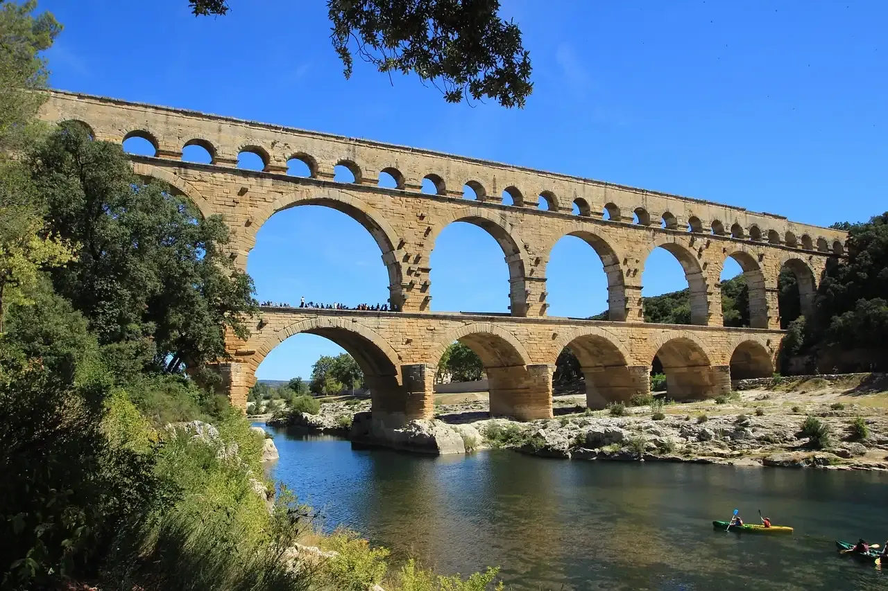 The three tiers of the Pont du Gard Roman aqueduct crossing the Gardon river