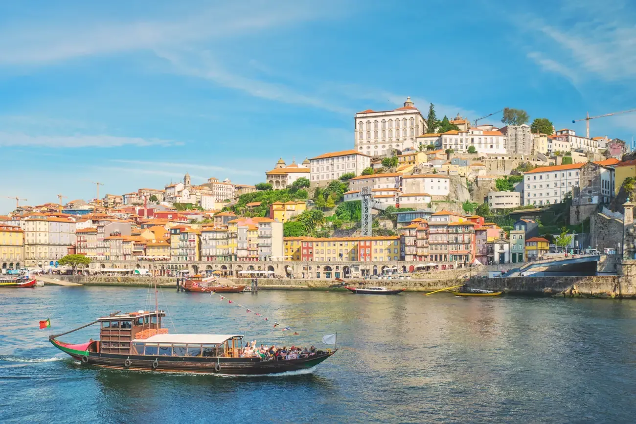 A rabelo boat on the Douro in front of the Ribeira quarter of Porto