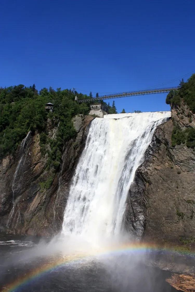 A rainbow at the foot of Montmorency Falls near Quebec City