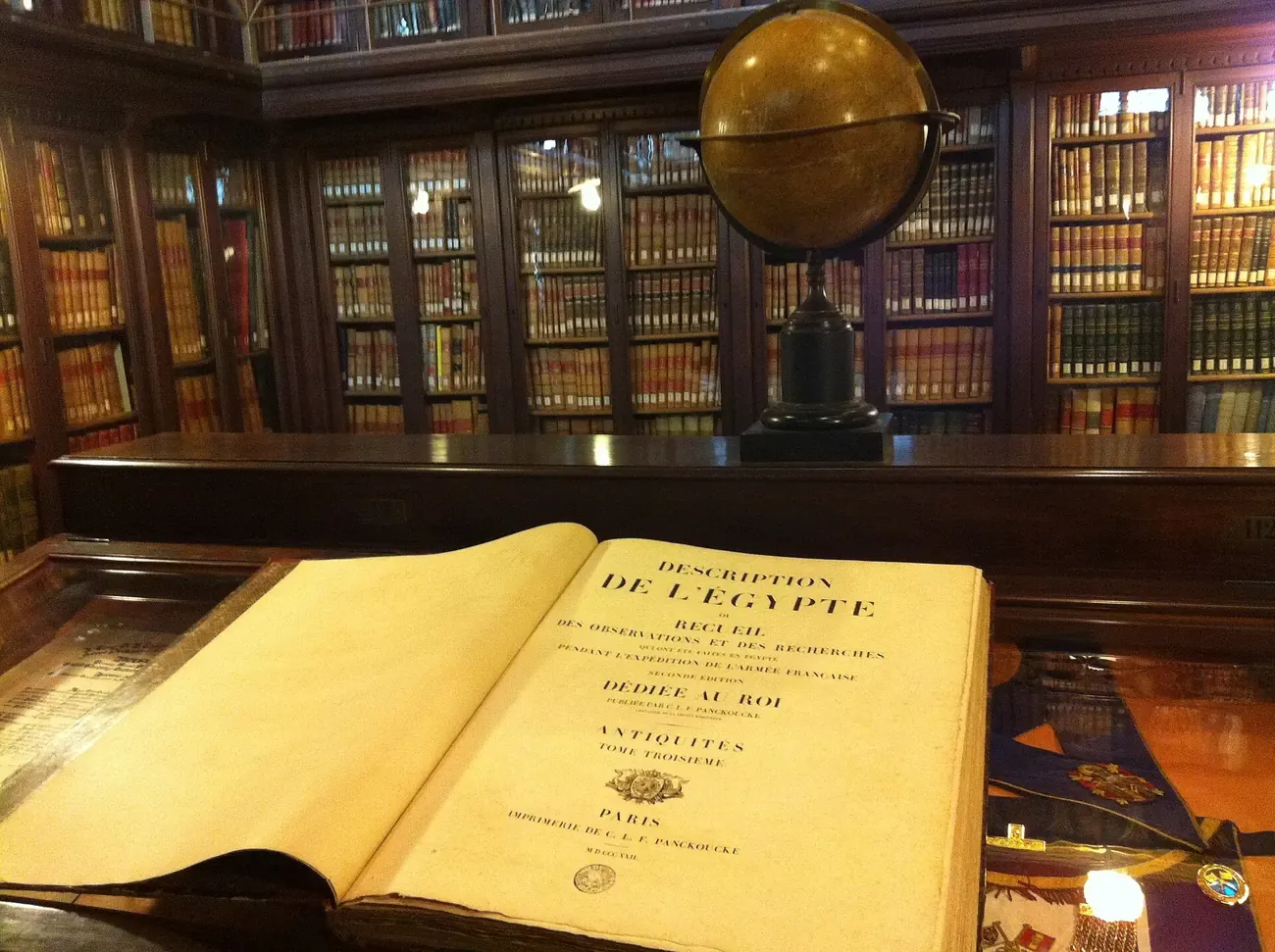 Antique globe and book at the Biblioteca Publica Arus in Barcelona