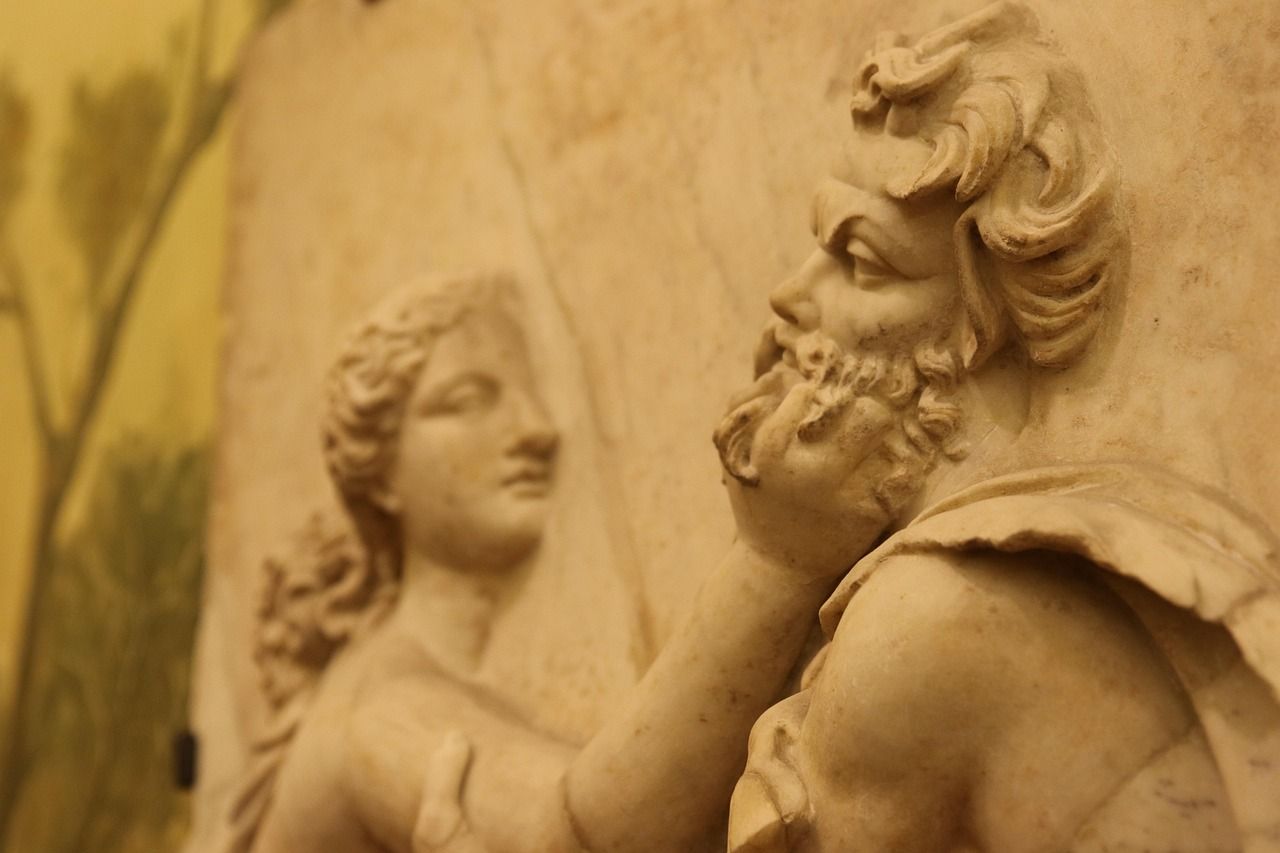 Close-up of an ancient Roman marble relief on display at the National Archaeological Museum of Naples.