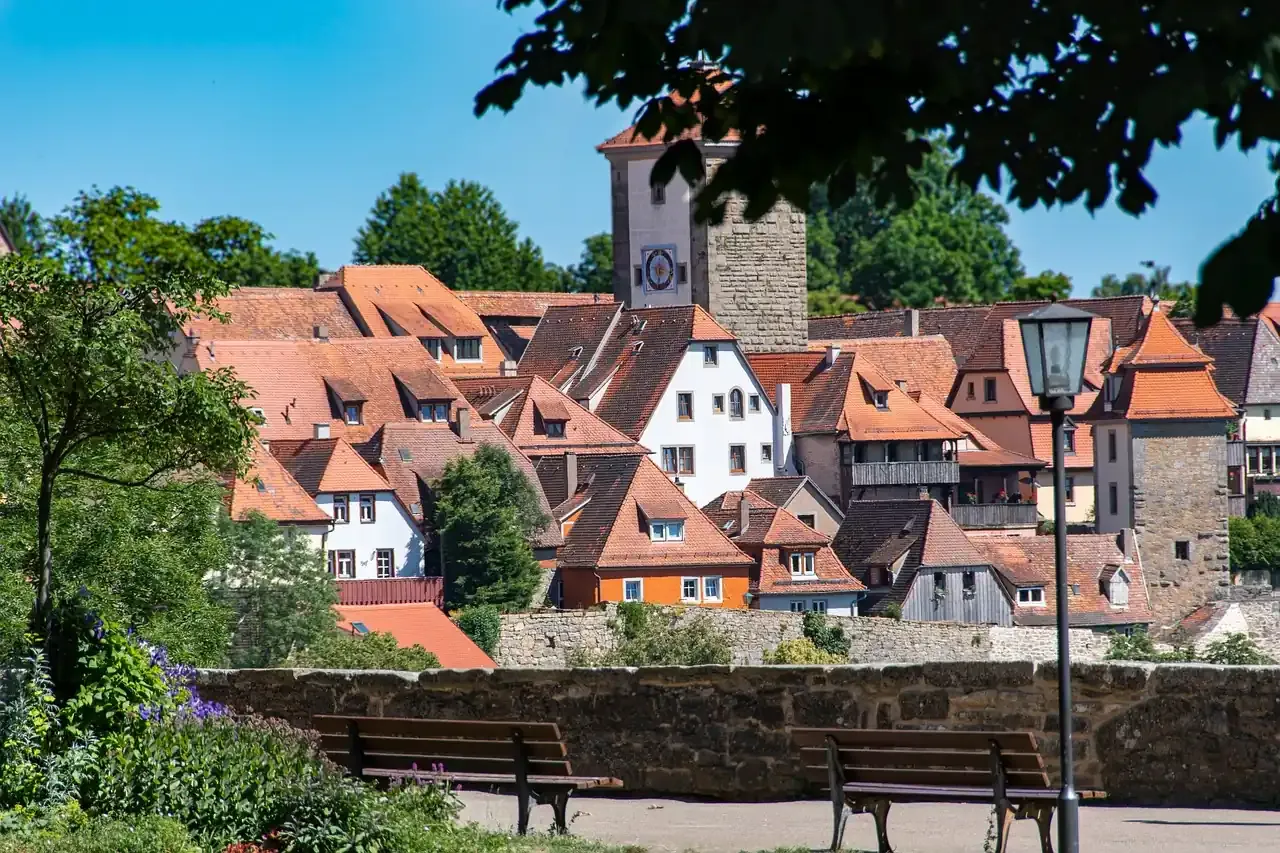 Red roofs and towers of the old town seen from the town wall in Rothenburg ob der Tauber